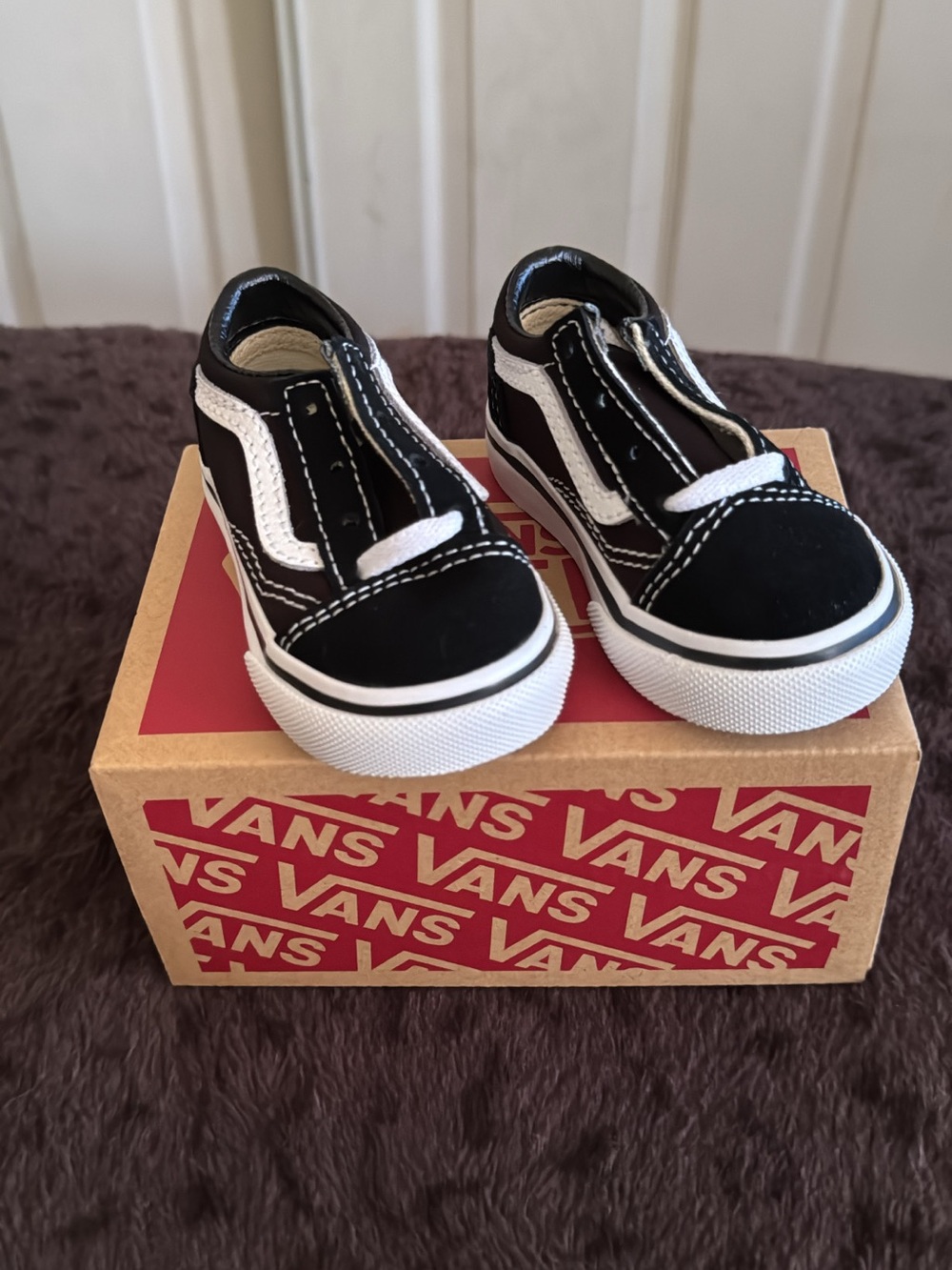 Vans Old Skool Toddler Slip-On Sneakers in Black & White
